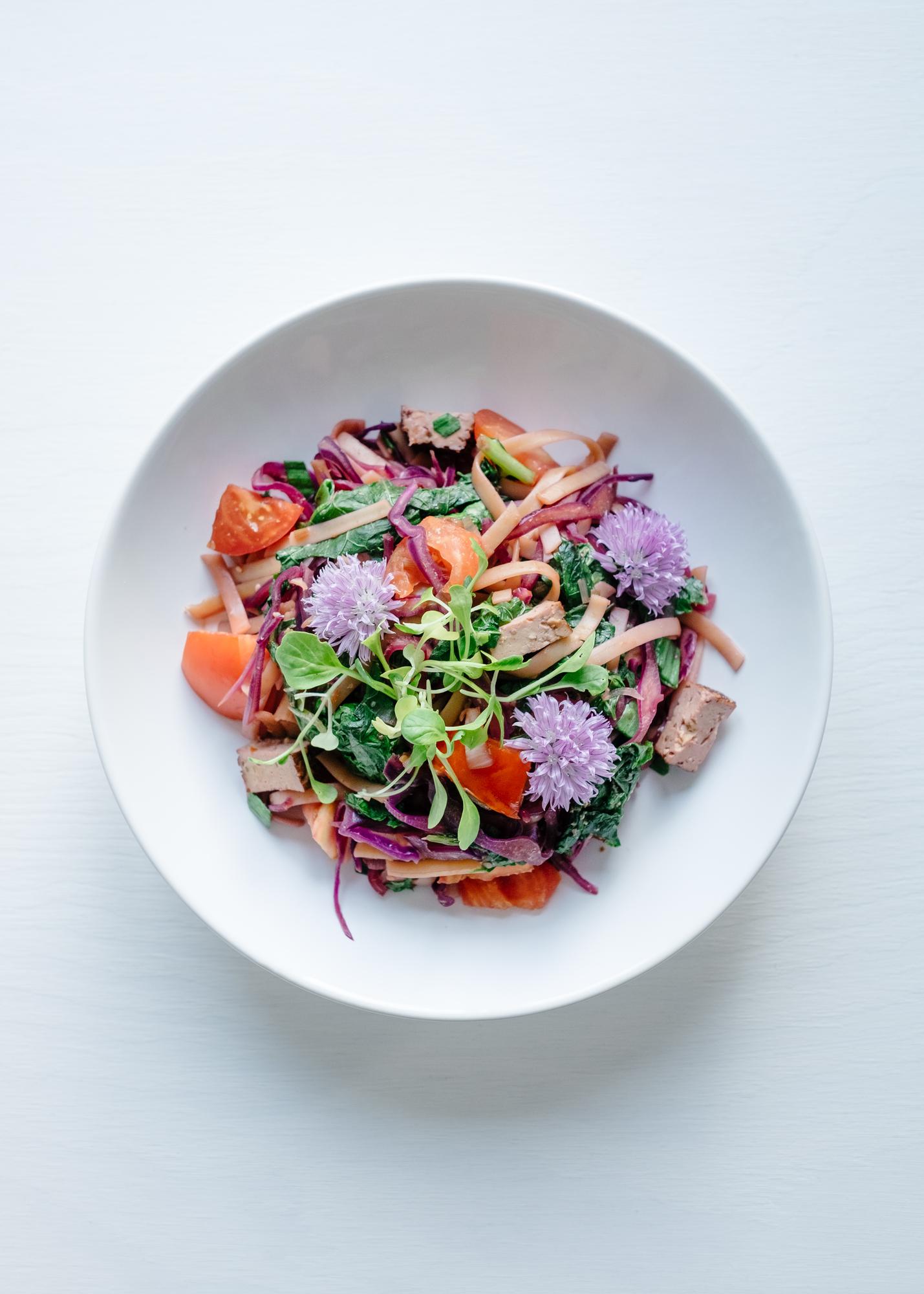 Colorful seasonal salad plated simply